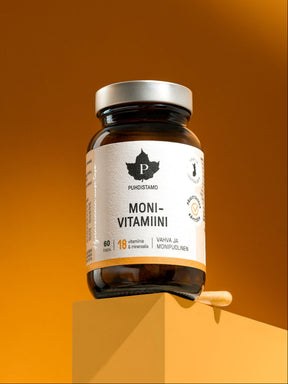 Puhdistamon monivitamiini oranssilla taustalla