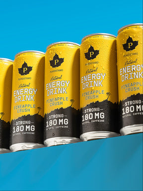 Puhdistamon Natural Energy Drink Pineapple Crush tölkkejä rivissä