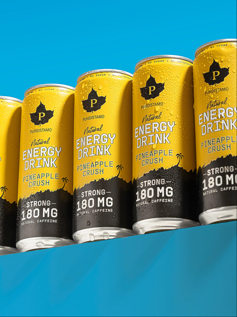 Puhdistamon Natural Energy Drink Pineapple Crush tölkkejä rivissä