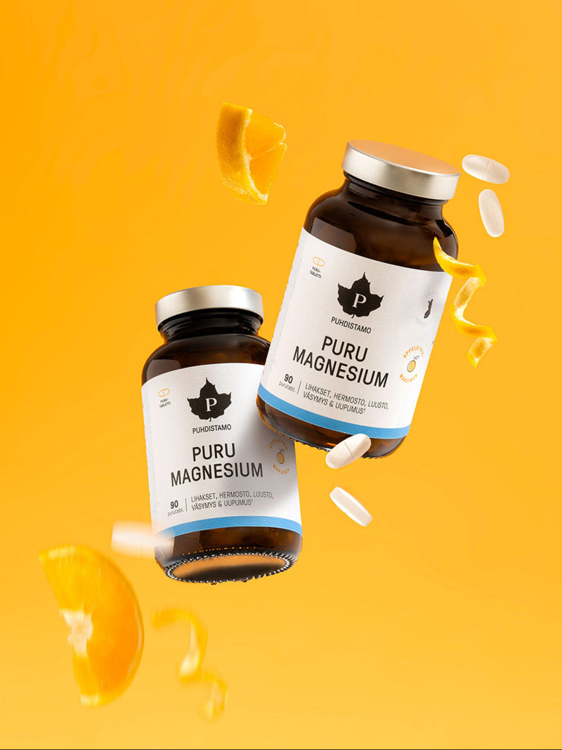 Puhdistamon Puru Magnesium oranssia taustaa vasten