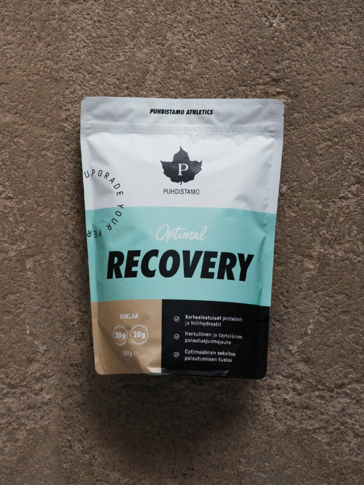 Puhdistamon Optimal Recovery Suklaa pussi kivilattialla