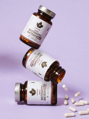 Puhdistamon 3 purkkia Vahvaa 30 mrd. Maitohappobakteeria lilaa taustaa vasten